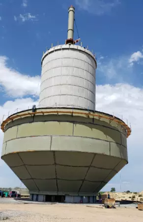 close-up of the South Water tank being built and the skirt-like water tank sitting at the bottom. 
